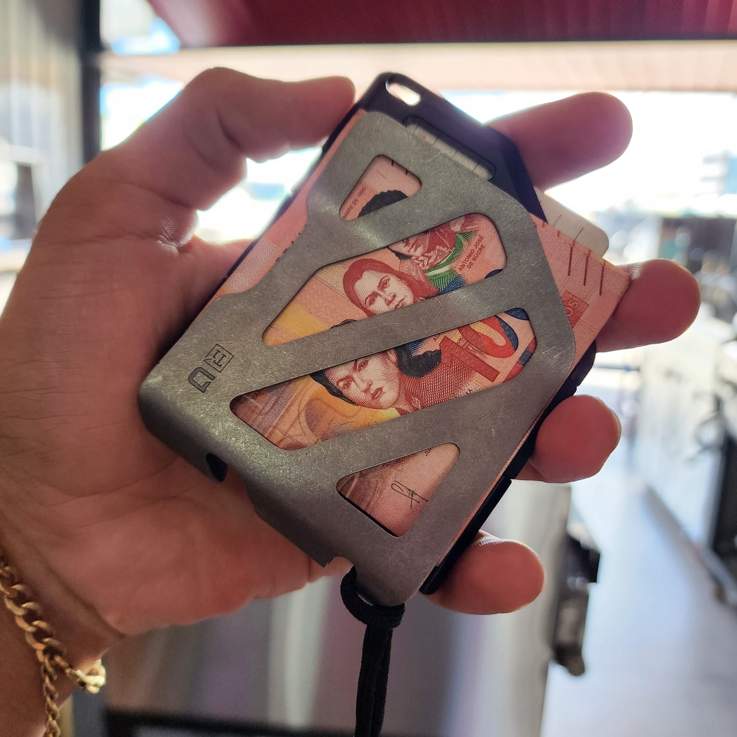 Customer photo review of MC01 TITANIUM MONEY CLIP