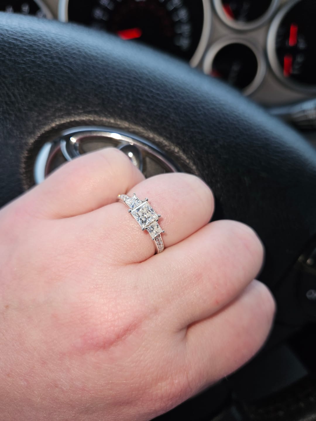 Customer photo review of Three Stone Princess Cut Moissanite Pavé Set Engagement Ring