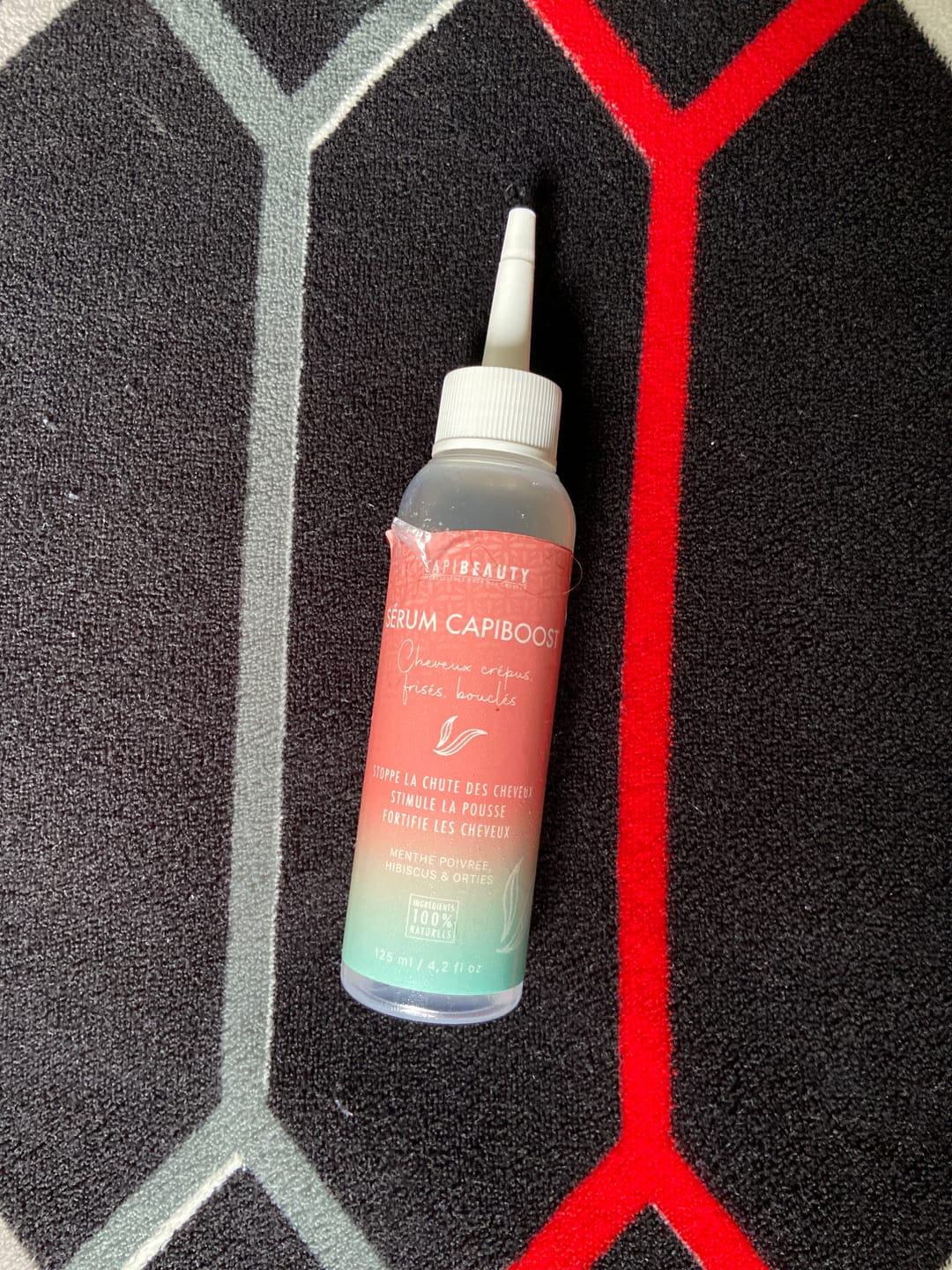 Customer photo review of Sérum Capiboost Hibiscus & Orties 120ml pour la pousse des cheveux bouclés frisés crépus