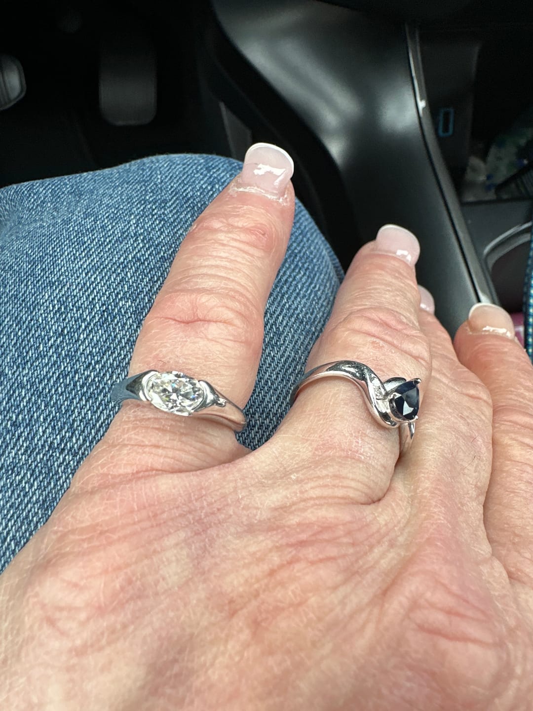 Customer photo review of Solitaire Oval Moissanite Half Bezel Set Engagement Ring