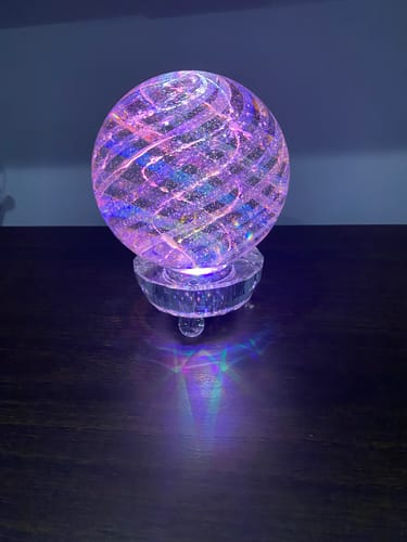 Customer photo review of Illuminated Dichroic Rainbow Orb with Cremains