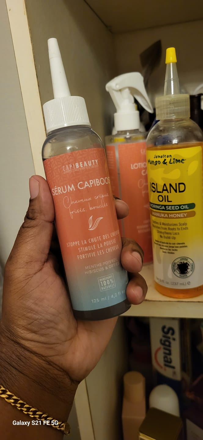 Customer photo review of Sérum Capiboost Hibiscus & Orties 120ml pour la pousse des cheveux bouclés frisés crépus