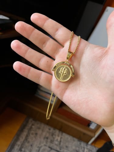 Customer photo review of Trident : Conquer From Within - Double Sided Pendant ( Gold )