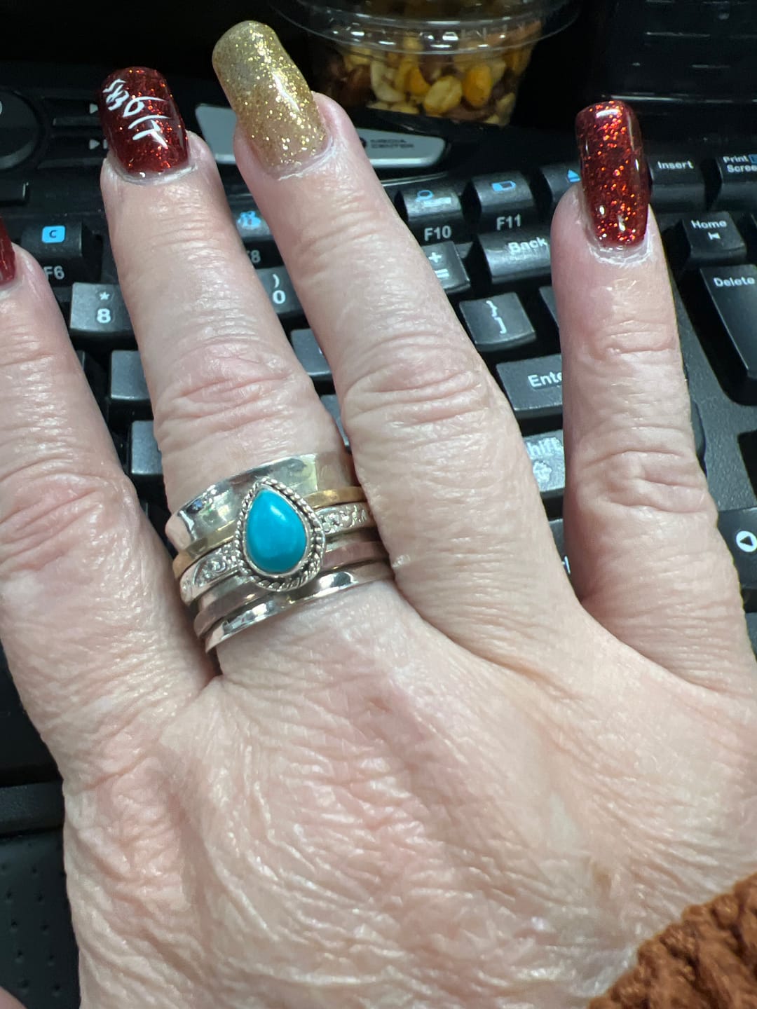 Customer photo review of Teardrop Turquoise Fidget Ring Sterling Silver