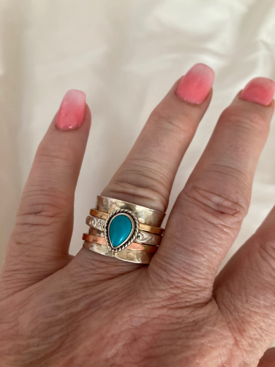 Customer photo review of Teardrop Turquoise Fidget Ring Sterling Silver