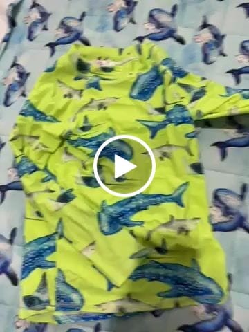 Customer video review of Fluro Green Sharks Kids' Rash Top