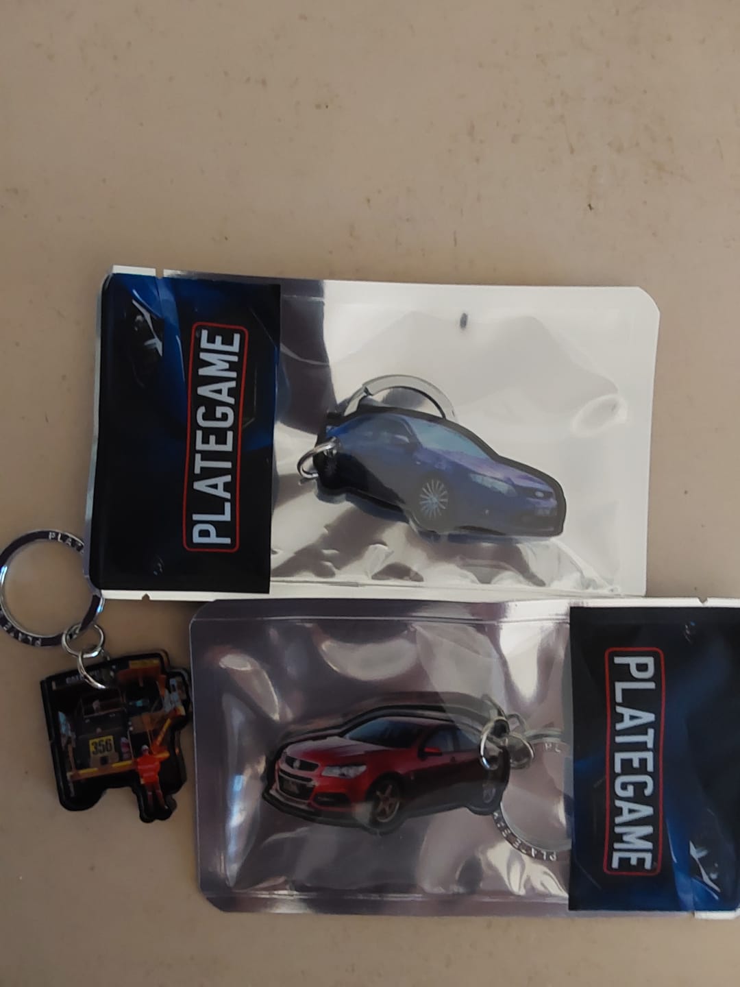 Customer photo review of PG Mini Custom Keychain