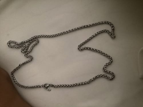 Reseña con foto de un cliente sobre Cadena Snake