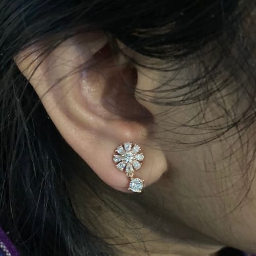 Customer photo review of Rose Gold Floral Earrings