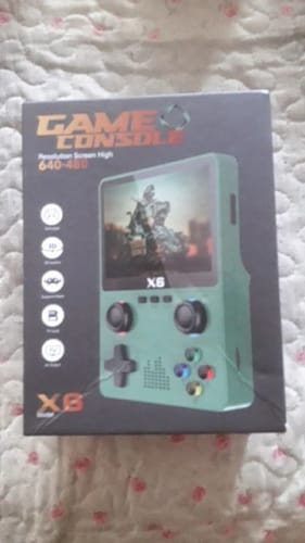 Reseña con foto de un cliente sobre Consola de videojuegos RetroGamer® portatíl