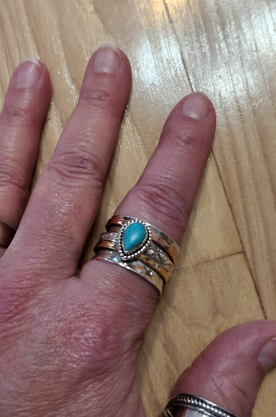 Customer photo review of Teardrop Turquoise Fidget Ring Sterling Silver