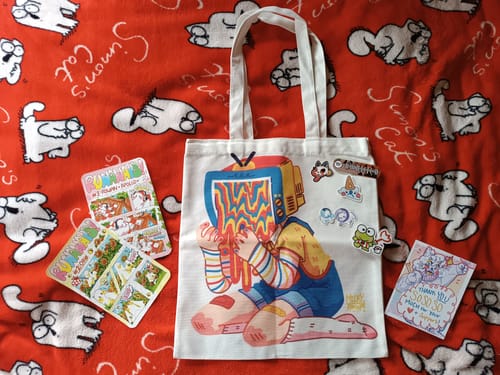 Customer photo review of Drippy Saturated TV Head Tote Bag