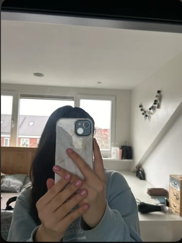 Customer photo review of Marble Off Whites - iPhone 14