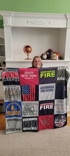 T-shirt quilt with firefighting, community service themes by Dianne from TN