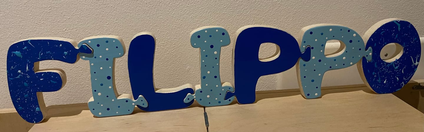 Customer photo review of LETTERE INCASTRINE - gioco per bimbi in stile montessori