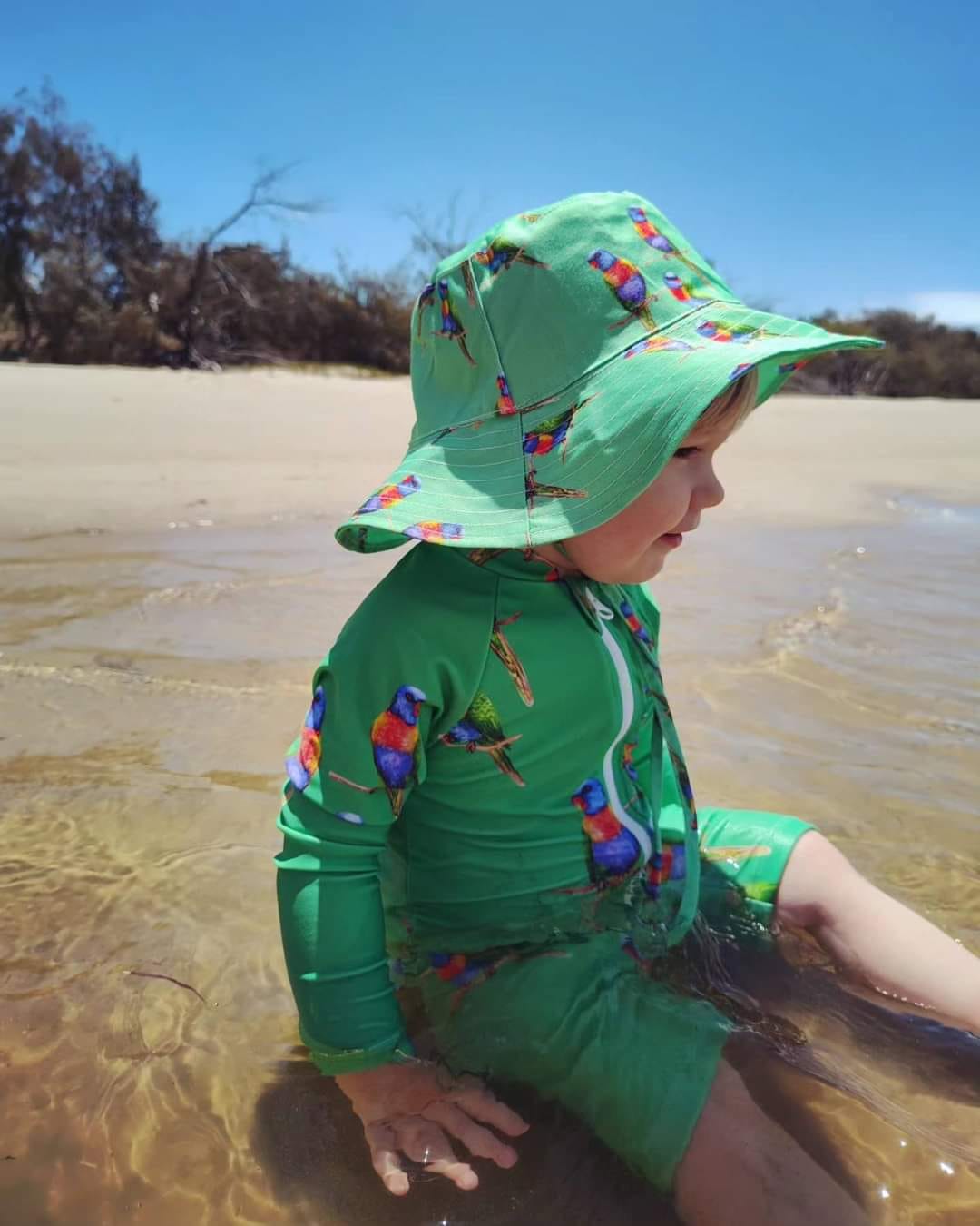 Customer photo review of Green Rainbow Lorikeet Beach Hat