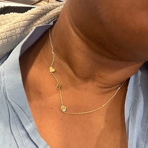 Customer photo review of Sideways Paw Letter Necklace