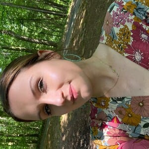 Customer photo review of Sideways Paw Letter Necklace