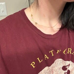 Customer photo review of Sideways Paw Letter Necklace
