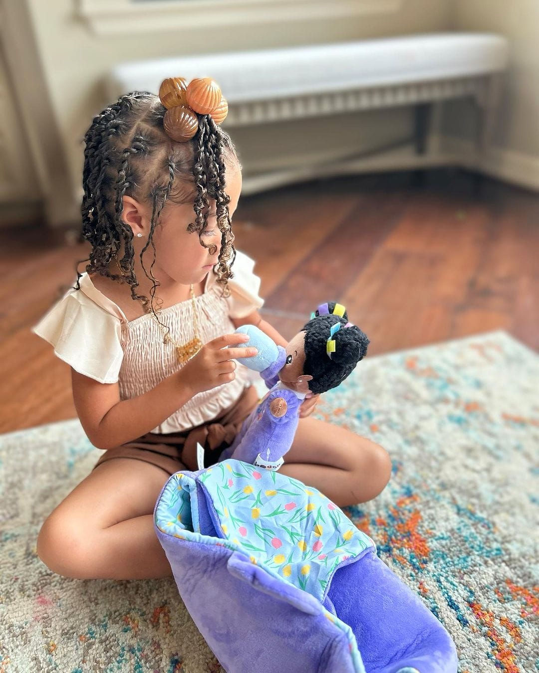 Customer photo review of Personalized Purple Deep Skin Tone Mini Plush Baby Doll & Gift Set