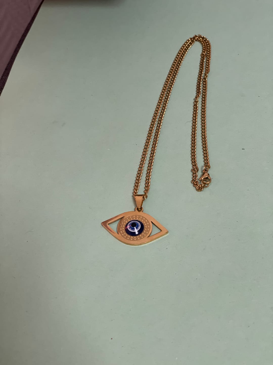 Customer photo review of Pendentif Oeil Bleu - Protection du Mauvais Oeil
