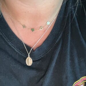 Customer photo review of Sideways Paw Letter Necklace