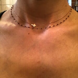 Customer photo review of Sideways Cross Necklace