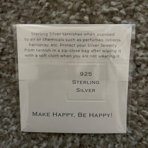 Customer photo review of Sideways Paw Letter Necklace