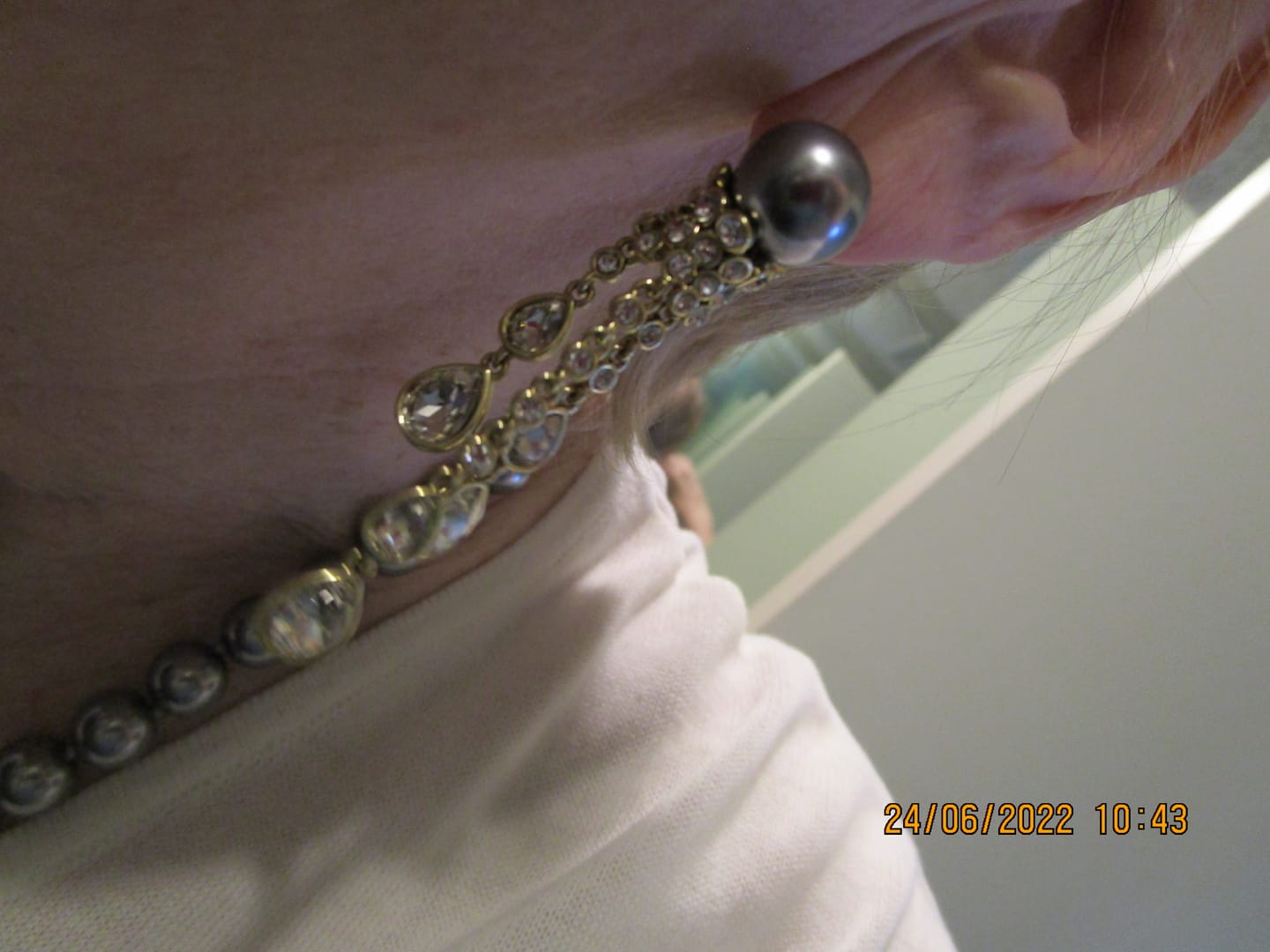 Customer photo review of Heidi Daus® "Elegant Tear Drop" Beaded Crystal Drop Earrings