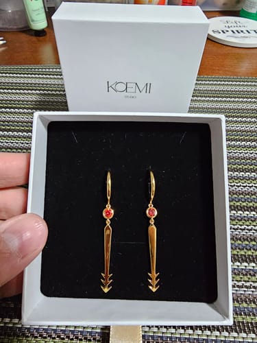 Customer photo review of Blood Manipulation Earrings