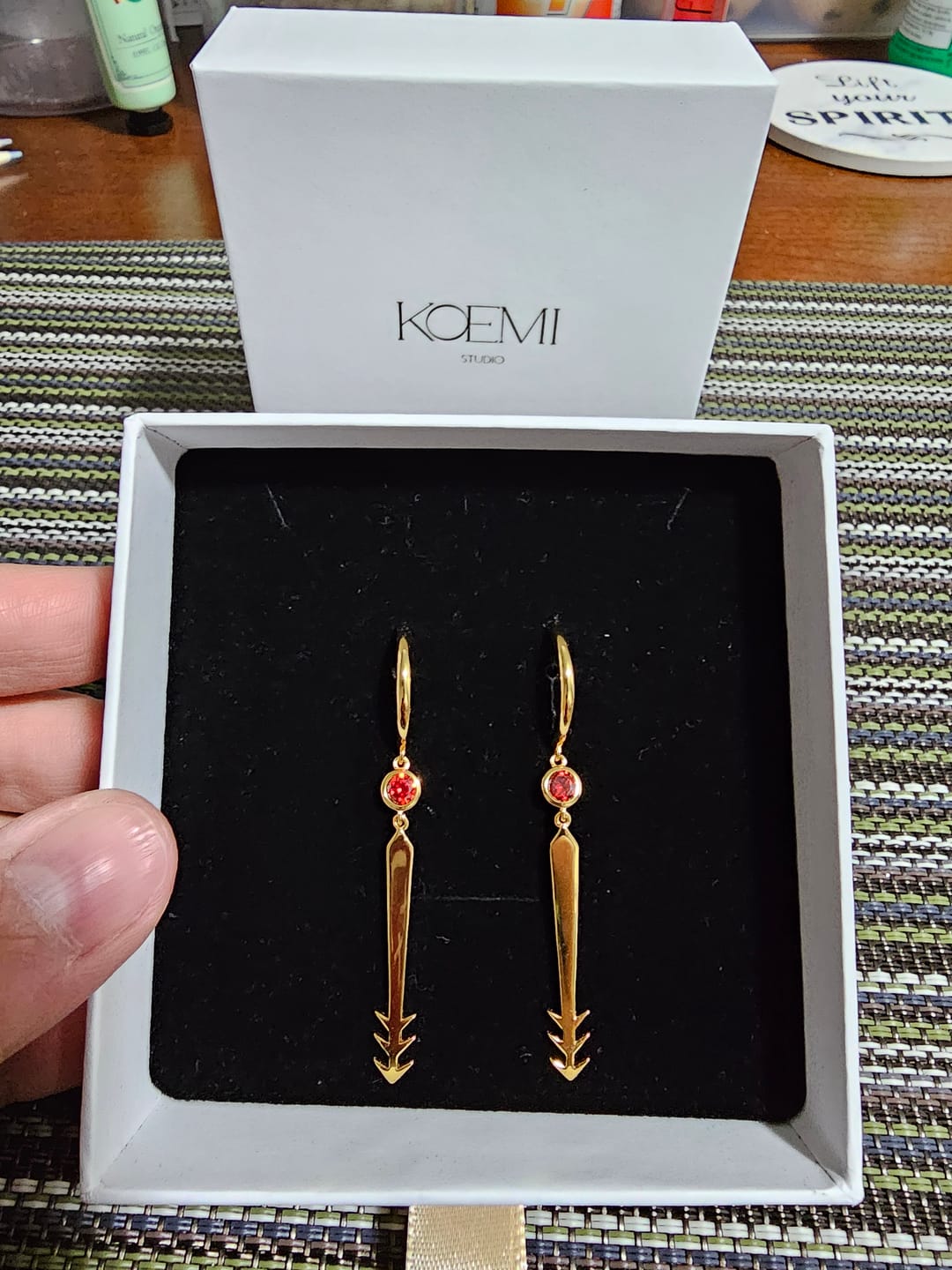 Customer photo review of Blood Manipulation Earrings
