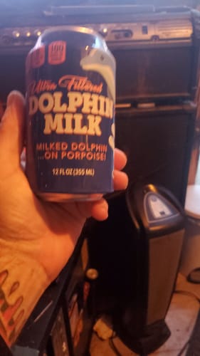 Customer photo review of Dolphin Milk Beersy Silicone Sleeve Hide-a-Beer Can Cooler