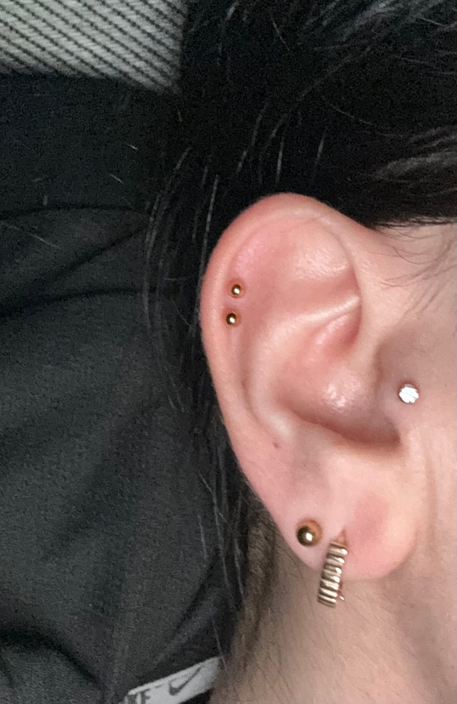 Customer photo review of Shining Point Piercing | Titan