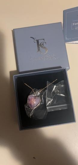 Customer photo review of Custom Heart Memorial Urn Necklaces