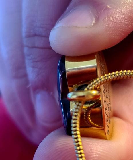 Customer photo review of Custom Heart Memorial Urn Necklaces