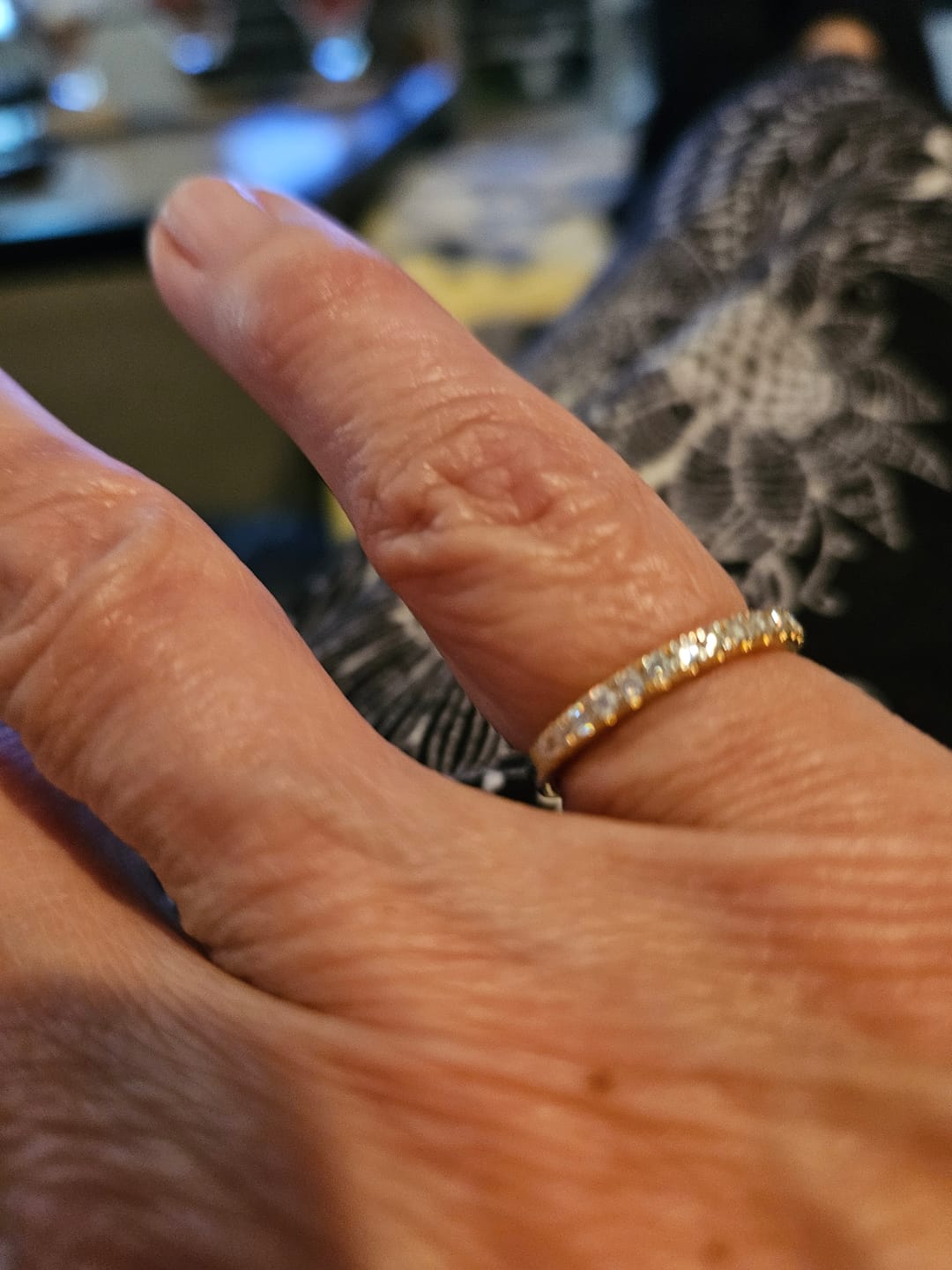 Customer photo review of Moissanite Round Half Eternity Sterling Silver Wedding Band Stackable Ring
