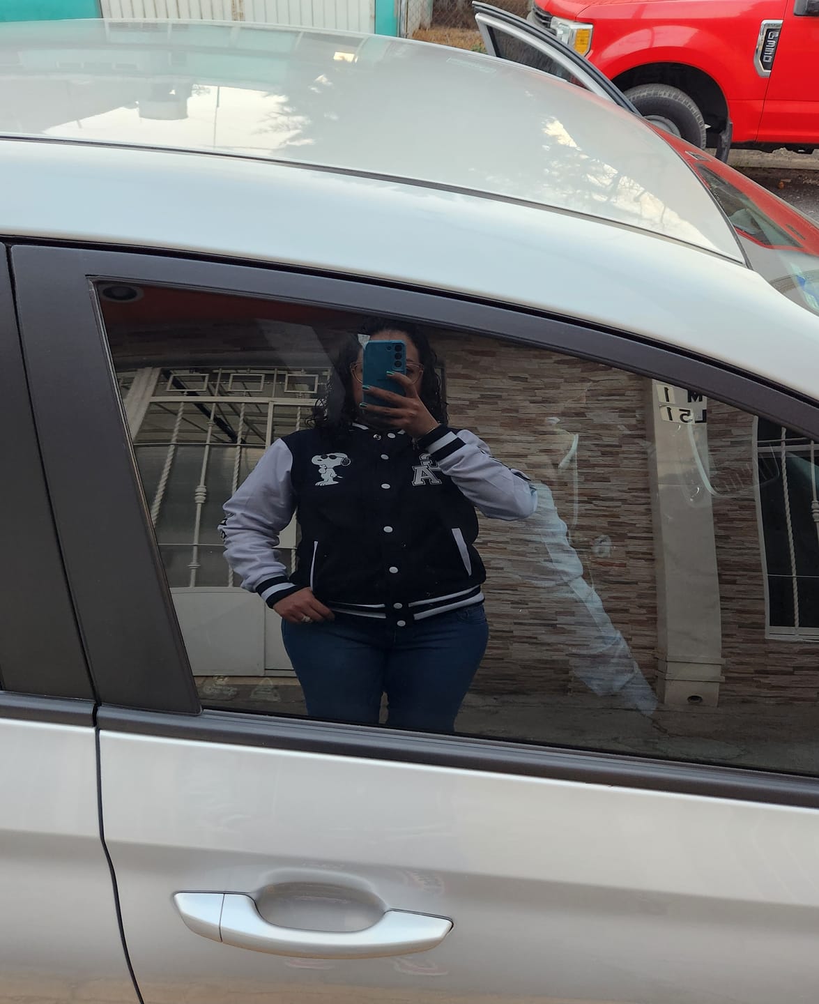 Customer photo review of Chamarra Universitaria Snoopy