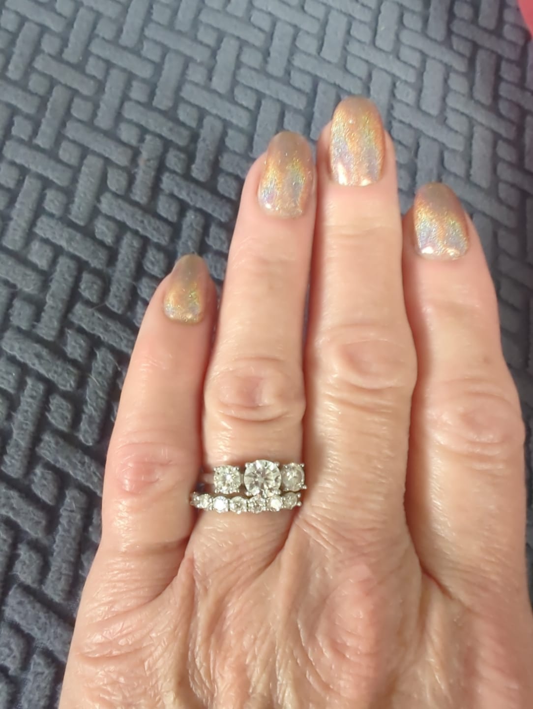 Customer photo review of Classic Three Stone Round Cut Moissanite Engagement Ring