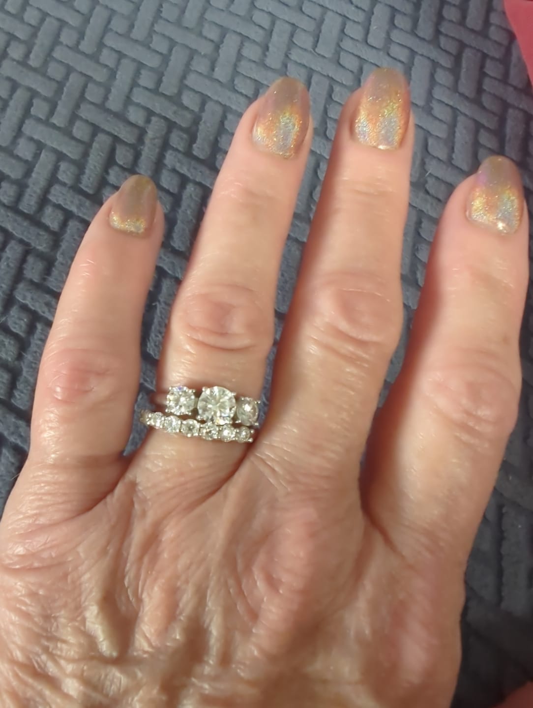 Customer photo review of Round Moissanite Sterling Silver Wedding Band Stackable Ring