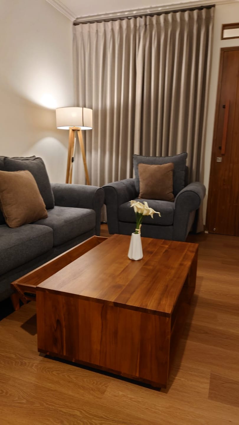 Customer photo review of Timeless Teak Coffee Table with Seamless Storage