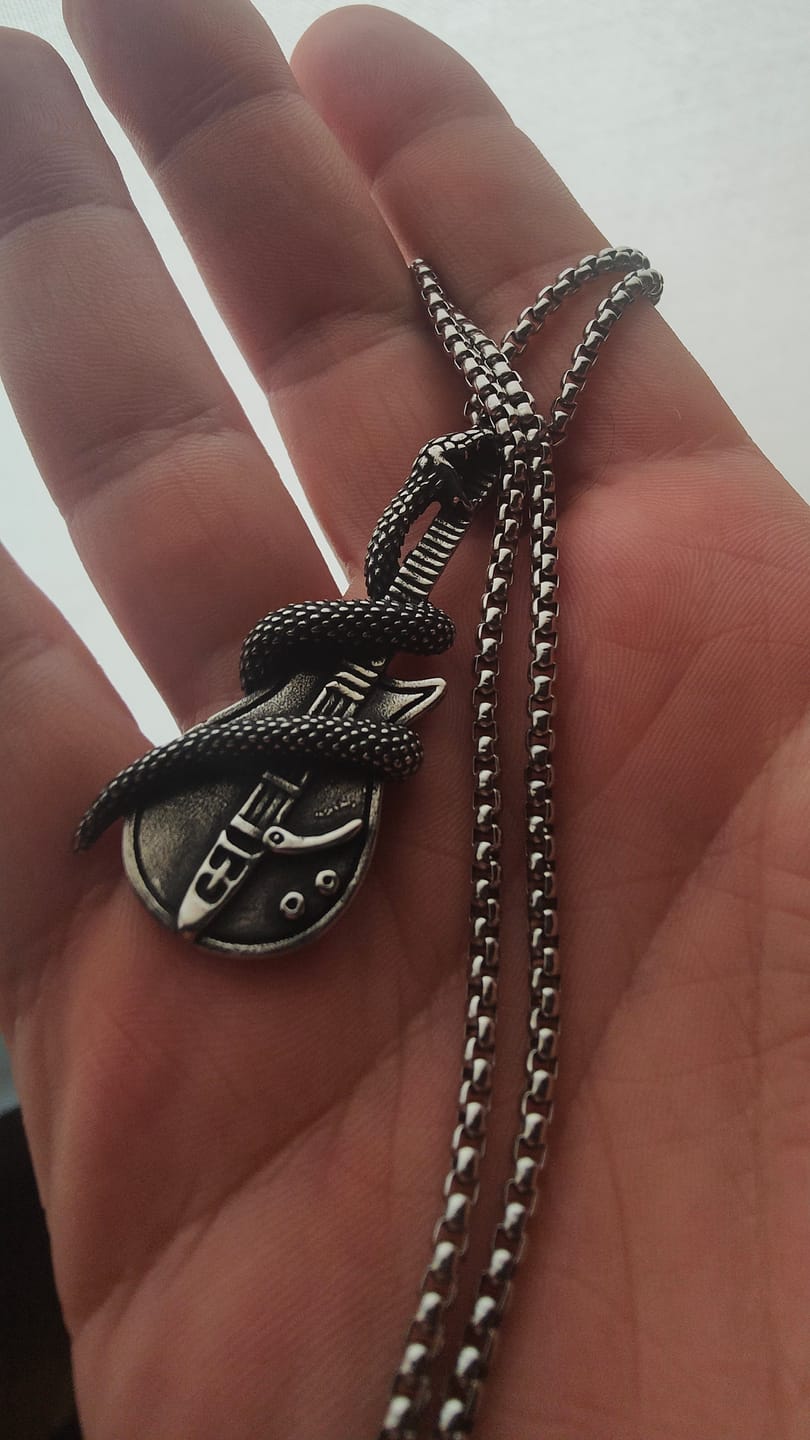 Customer photo review of THE SERPENT GUITAR. - NECKLACE