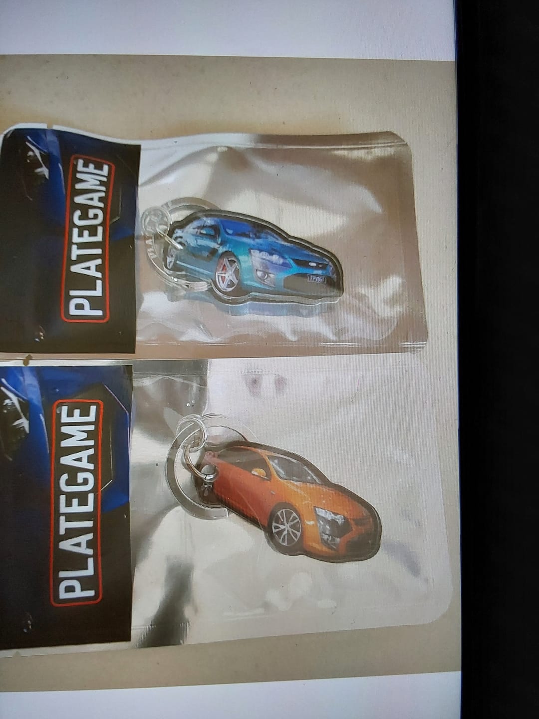 Customer photo review of PG Mini Custom Keychain