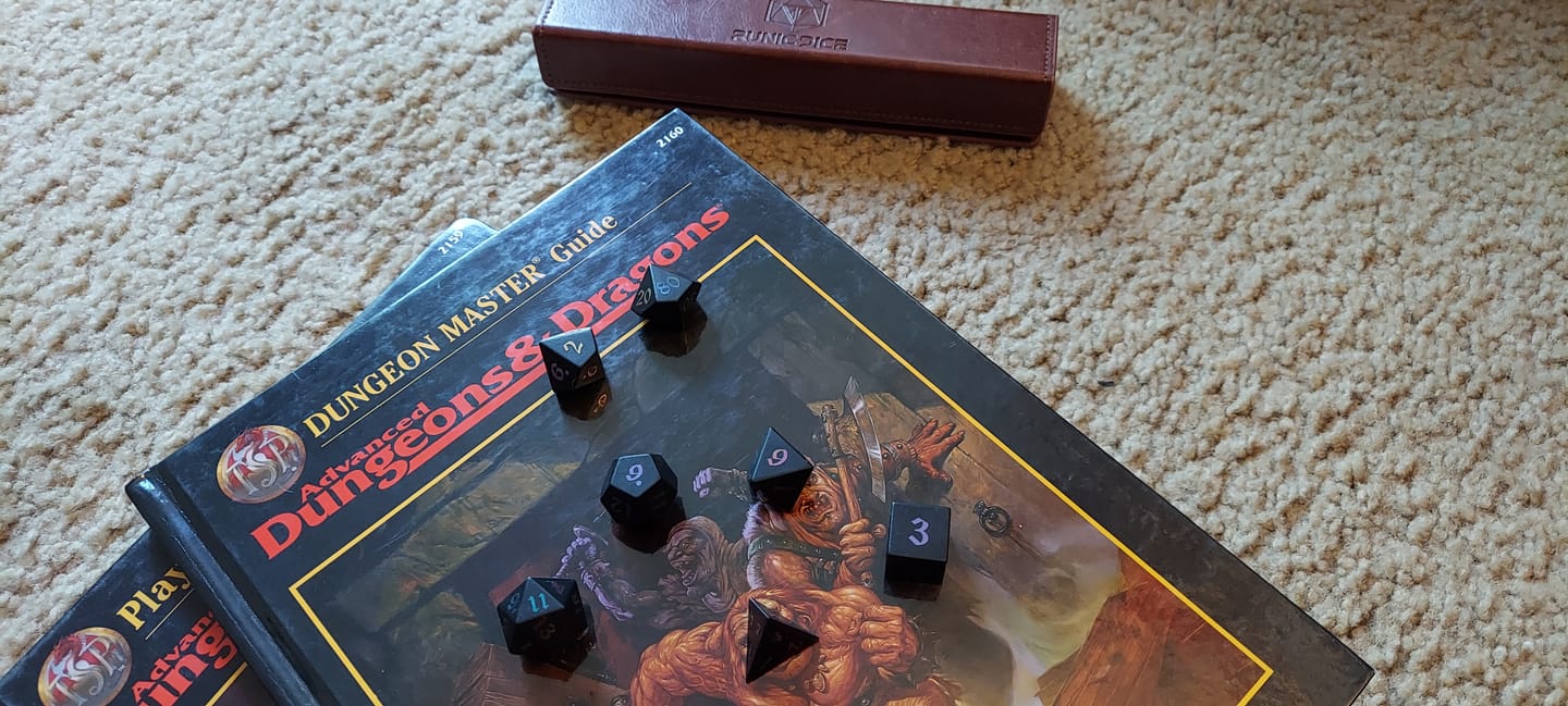 Customer photo review of Inked Black Night Raised Obsidian Hand Carved Dice (And Box) DND Set