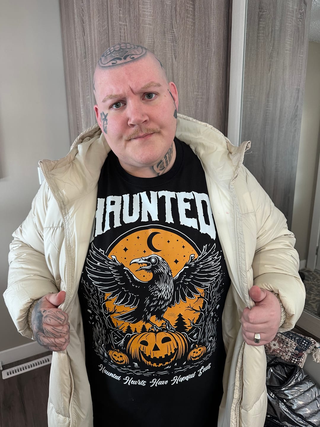 Customer photo review of Haunted Tshirt