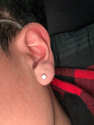 Customer photo review of VVS Moissanite Solitaire Stud Earrings