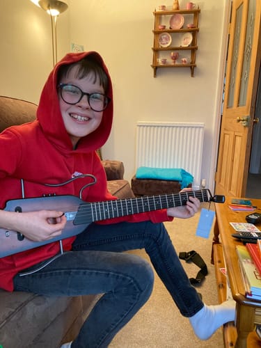 Customer photo review of Donner HUSH-I Headless Hush Guitar Kit