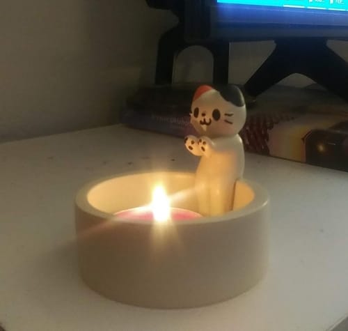 Customer photo review of Cartoon Kitten Cat Candle Holder (Candle Not Included)