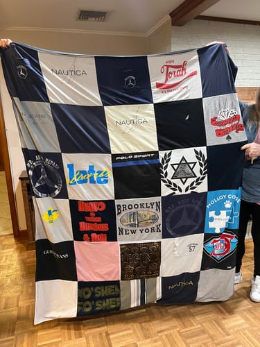 T-shirt quilt from catholic college by Nicole from NY