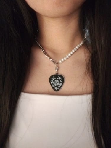 Customer photo review of BTS Suga Amygdala Jewelry