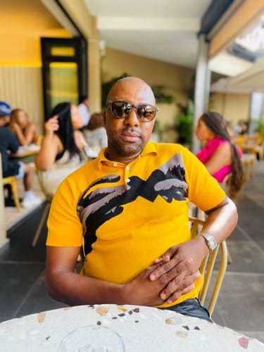 Customer photo review of MARCI FRANC SANKOFA POLO SHIRT